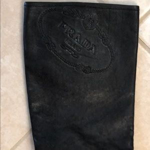 Bellow knee length leather Prada boots